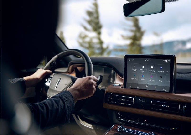 The Lincoln+Alexa app screen is displayed in the center screen of a 2023 Lincoln Aviator® Grand Touring SUV | Lincoln of New Bern in New Bern NC