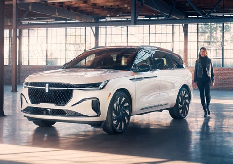 A person approaches a 2025 Lincoln Nautilus® SUV. | Lincoln of New Bern in New Bern NC