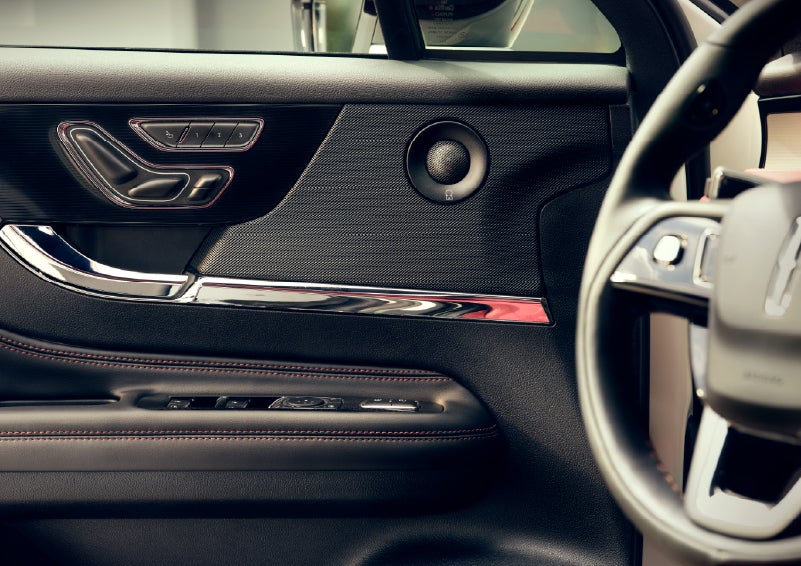 An audio speaker is shown in the driver's side door of a 2026 Lincoln Corsair® SUV | Lincoln of New Bern in New Bern NC