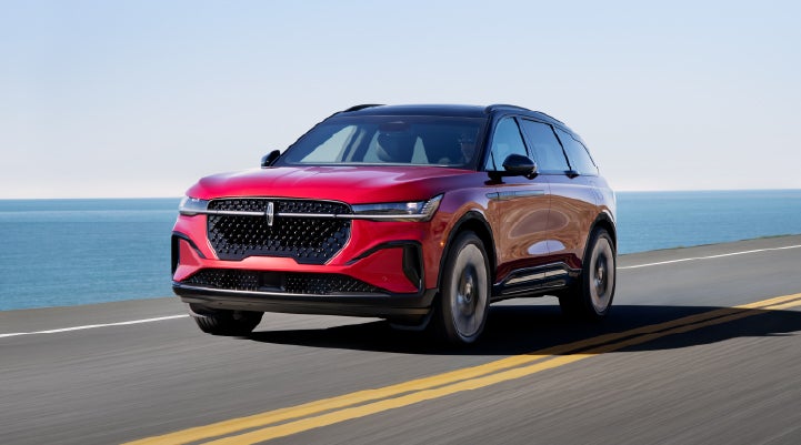 A 2026 Lincoln Nautilus® SUV is being driven on a seaside roadway. | Lincoln of New Bern in New Bern NC