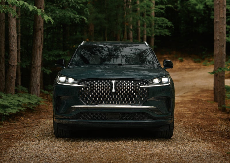 The front grille of a 2027 Lincoln Aviator® Black Label™ SUV is shown. | Lincoln of New Bern in New Bern NC